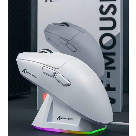 Mouse Attack Shark X11 branco apoiado na base